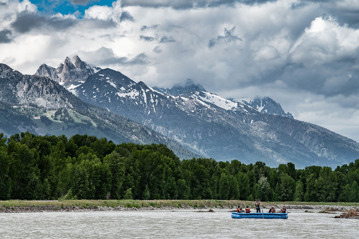 Rafting on the Snake River in Front of the Teton Mountain Range - Backcountry Safaris