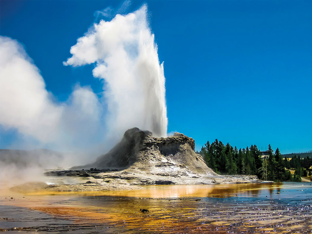 Geyser Erupting on Yellowstone Tour from Big Sky, MT - Backcountry Safaris