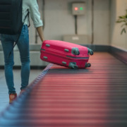 Red Luggage at Carousel
